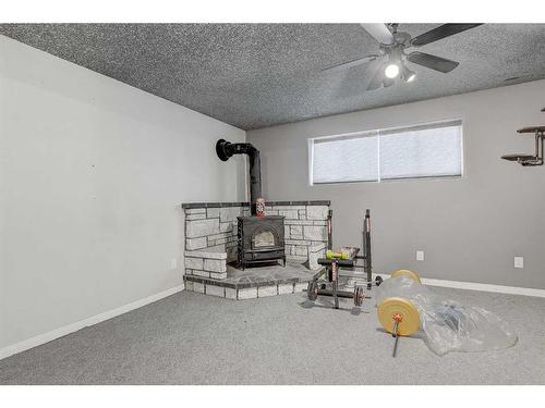 13-71204 Range Road 55, Grande Prairie, AB - Indoor With Fireplace