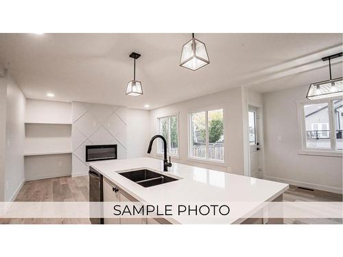 7125 86 Street, Grande Prairie, AB - Indoor Photo Showing Kitchen With Double Sink