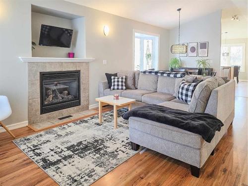 7 - 131 Moberly Road, Grande Cache, AB - Indoor Photo Showing Living Room With Fireplace