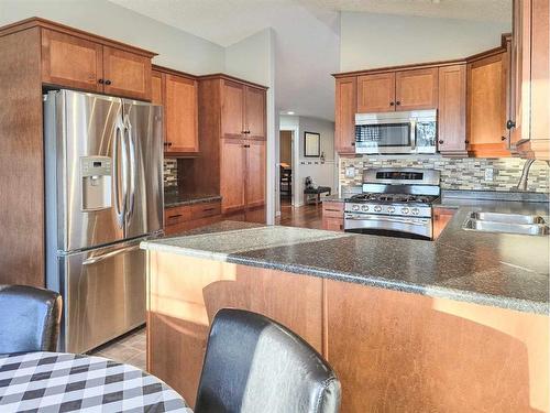 7 - 131 Moberly Road, Grande Cache, AB - Indoor Photo Showing Kitchen With Double Sink