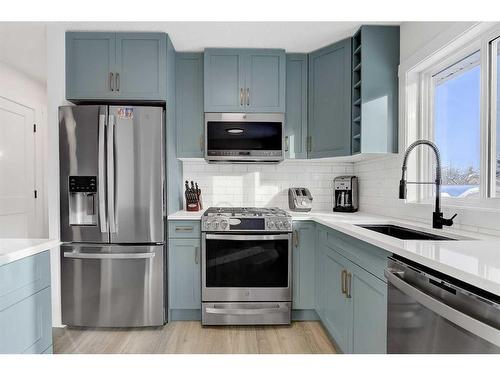 9815 79 Avenue, Grande Prairie, AB - Indoor Photo Showing Kitchen With Stainless Steel Kitchen With Upgraded Kitchen