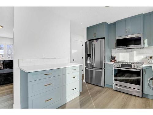 9815 79 Avenue, Grande Prairie, AB - Indoor Photo Showing Kitchen With Stainless Steel Kitchen