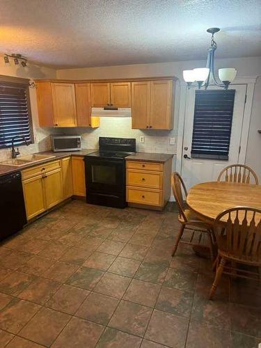 11250 75A Avenue, Grande Prairie, AB - Indoor Photo Showing Kitchen