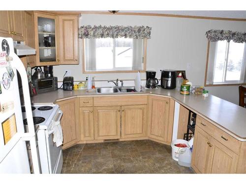 82440 Range Road 221, Rural Northern Sunrise County, AB - Indoor Photo Showing Kitchen With Double Sink