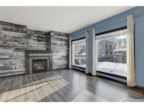 11313 81 Avenue, Grande Prairie, AB - Indoor Photo Showing Living Room With Fireplace