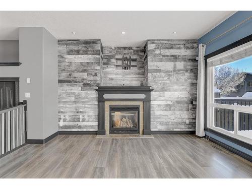 11313 81 Avenue, Grande Prairie, AB - Indoor Photo Showing Living Room With Fireplace