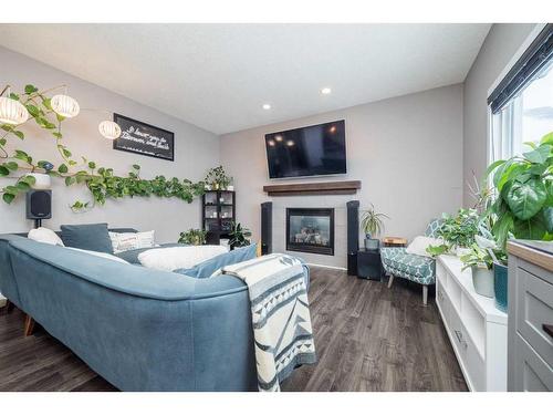 12918 106A Street, Grande Prairie, AB - Indoor Photo Showing Living Room With Fireplace