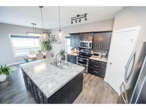 12918 106A Street, Grande Prairie, AB - Indoor Photo Showing Kitchen With Double Sink With Upgraded Kitchen