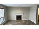 10354 70 Avenue, Grande Prairie, AB  - Indoor Photo Showing Living Room With Fireplace 