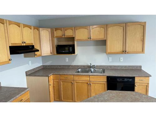 10354 70 Avenue, Grande Prairie, AB - Indoor Photo Showing Kitchen With Double Sink