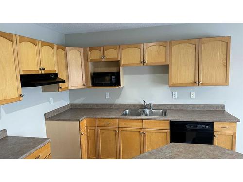 10354 70 Avenue, Grande Prairie, AB - Indoor Photo Showing Kitchen With Double Sink