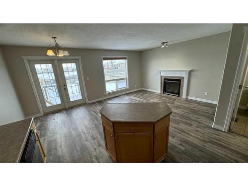 10354 70 Avenue, Grande Prairie, AB - Indoor Photo Showing Living Room With Fireplace