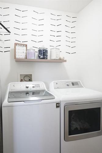 231-10150 121 Avenue, Grande Prairie, AB - Indoor Photo Showing Laundry Room