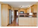 42 Pinnacle Street, Grande Prairie, AB  - Indoor Photo Showing Kitchen With Double Sink 