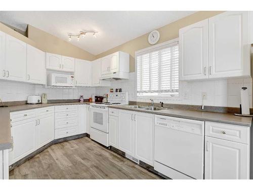 12309 Crystal Lake Drive, Grande Prairie, AB - Indoor Photo Showing Kitchen With Double Sink