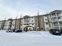 401-12015 Royal Oaks Drive, Grande Prairie, AB  - Outdoor With Balcony With Facade 