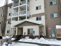 401-12015 Royal Oaks Drive, Grande Prairie, AB  - Outdoor With Balcony With Facade 