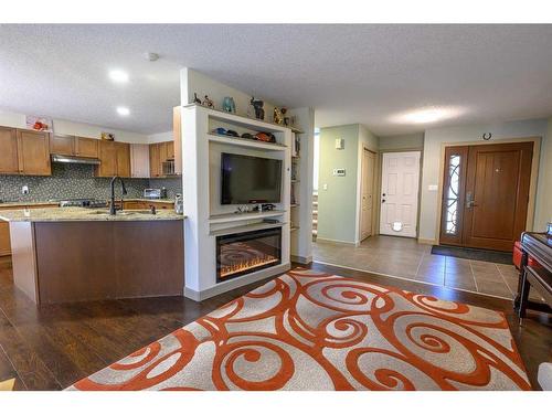 11105 60 Avenue, Grande Prairie, AB - Indoor Photo Showing Kitchen With Fireplace