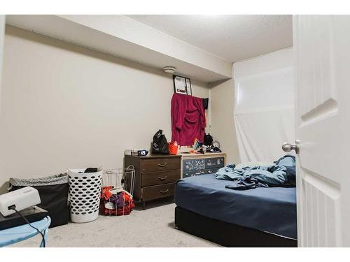 9713 112 Avenue, Clairmont, AB - Indoor Photo Showing Bedroom