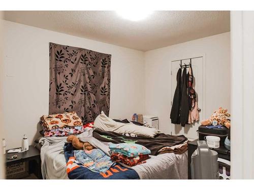 9713 112 Avenue, Clairmont, AB - Indoor Photo Showing Bedroom