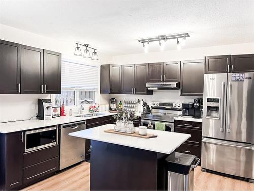 9209 101 Avenue, Sexsmith, AB - Indoor Photo Showing Kitchen With Double Sink