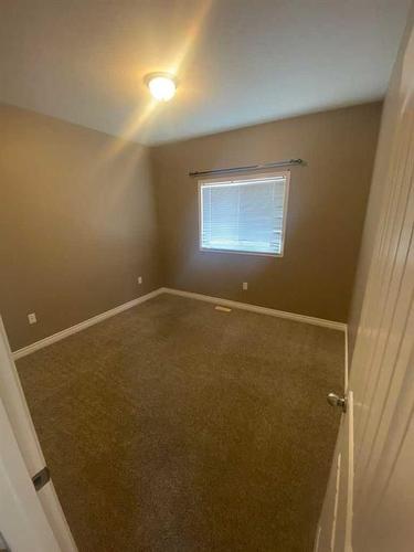 103-9229 Lakeland Drive, Grande Prairie, AB - Indoor Photo Showing Other Room