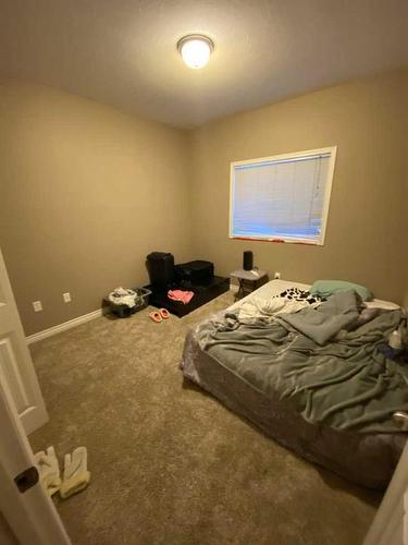 103-9229 Lakeland Drive, Grande Prairie, AB - Indoor Photo Showing Bedroom