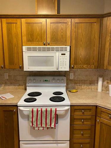 103-9229 Lakeland Drive, Grande Prairie, AB - Indoor Photo Showing Kitchen