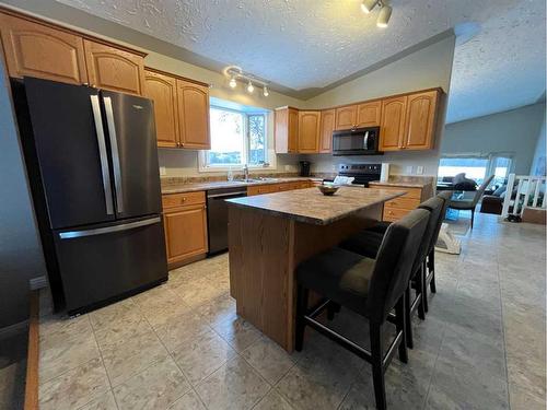 7909 94 Street, Peace River, AB - Indoor Photo Showing Kitchen With Double Sink