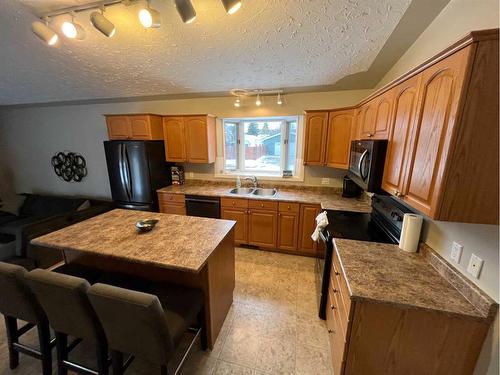 7909 94 Street, Peace River, AB - Indoor Photo Showing Kitchen With Double Sink