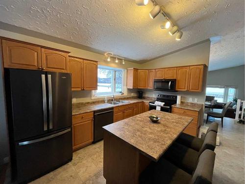 7909 94 Street, Peace River, AB - Indoor Photo Showing Kitchen With Double Sink