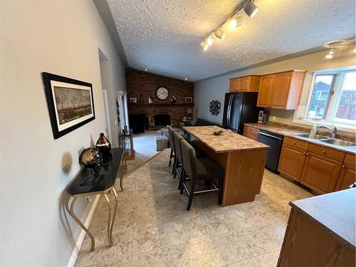 7909 94 Street, Peace River, AB - Indoor Photo Showing Kitchen With Double Sink