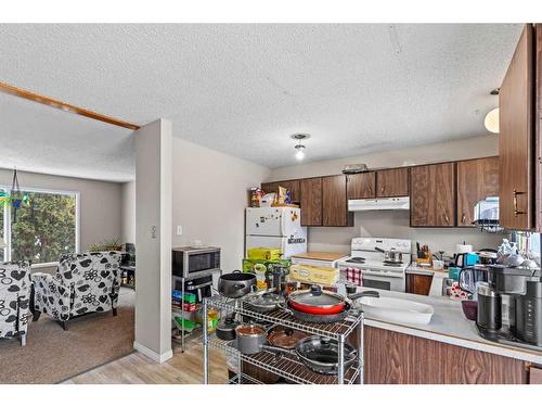 7702 Poplar Drive, Grande Prairie, AB - Indoor Photo Showing Kitchen