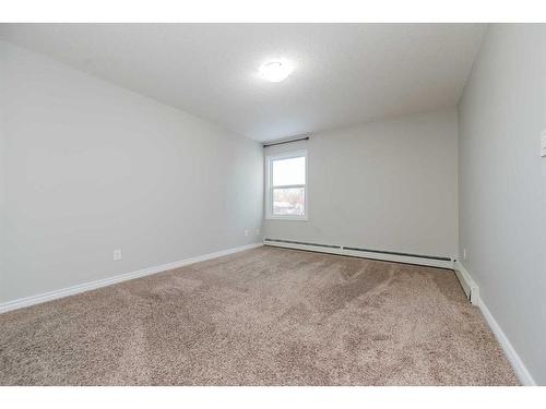 4103-7201 Poplar Drive, Grande Prairie, AB - Indoor Photo Showing Other Room