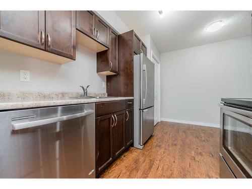 4103-7201 Poplar Drive, Grande Prairie, AB - Indoor Photo Showing Kitchen