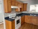 11501 107 Ave, Fairview, AB  - Indoor Photo Showing Kitchen With Double Sink 