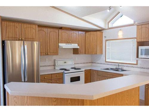 409 Silver Pointe Drive, Rural Grande Prairie No. 1, County Of, AB - Indoor Photo Showing Kitchen With Double Sink