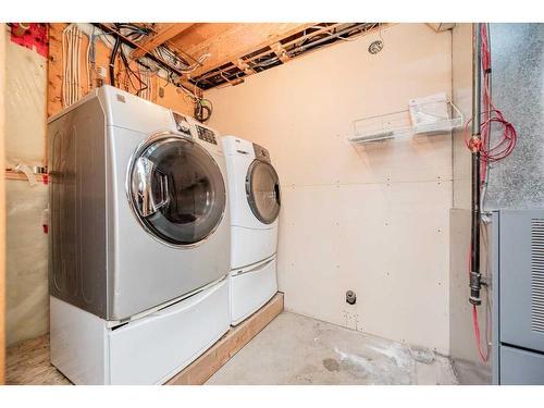 9901 104 Street, Sexsmith, AB - Indoor Photo Showing Laundry Room