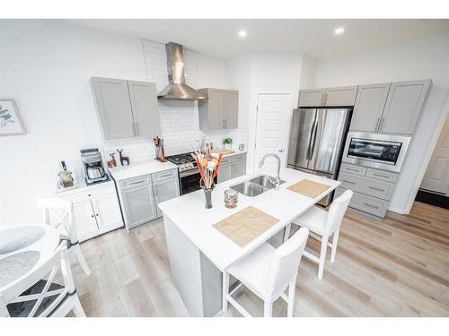 8809 86A Avenue, Grande Prairie, AB - Indoor Photo Showing Kitchen With Double Sink