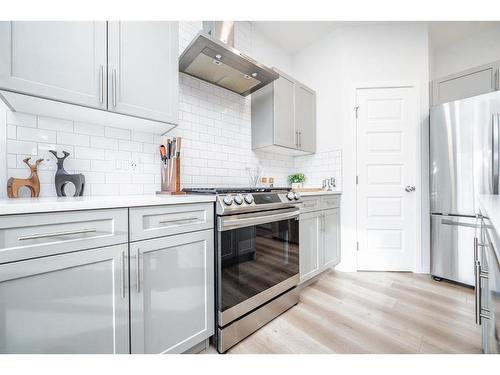 8809 86A Avenue, Grande Prairie, AB - Indoor Photo Showing Kitchen With Upgraded Kitchen