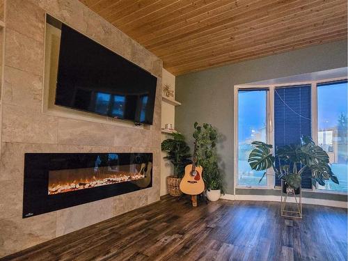 10709 98Th Avenue, Grande Cache, AB - Indoor Photo Showing Living Room With Fireplace