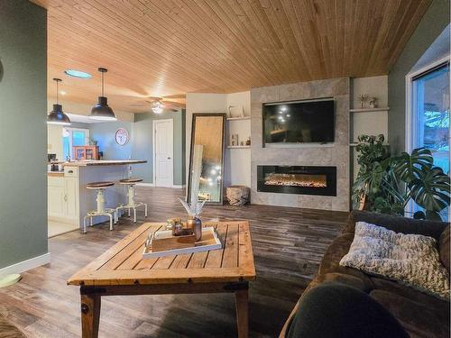 10709 98Th Avenue, Grande Cache, AB - Indoor Photo Showing Living Room With Fireplace