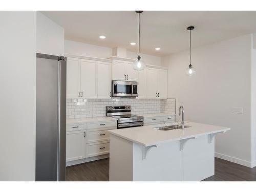 10214B 148 Avenue, Rural Grande Prairie No. 1, County Of, AB - Indoor Photo Showing Kitchen With Double Sink With Upgraded Kitchen