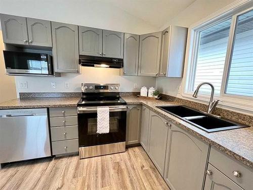 11509 78 Avenue, Grande Prairie, AB - Indoor Photo Showing Kitchen With Stainless Steel Kitchen With Double Sink