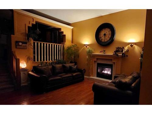 11918 105 Street, Grande Prairie, AB - Indoor Photo Showing Living Room With Fireplace