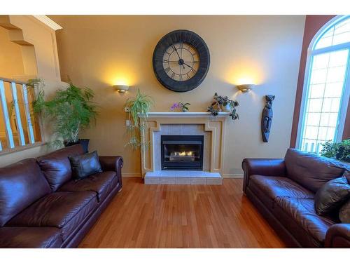 11918 105 Street, Grande Prairie, AB - Indoor Photo Showing Living Room With Fireplace