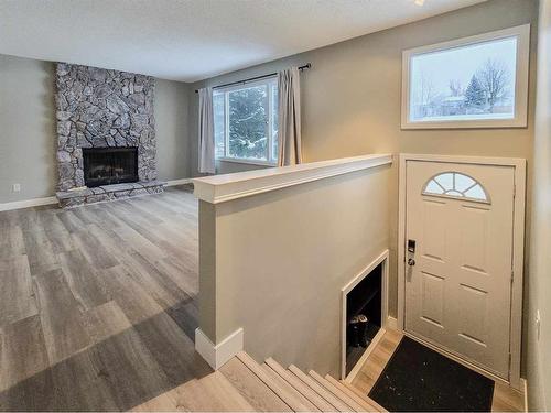 10710 104Th Avenue, Grande Cache, AB - Indoor Photo Showing Living Room With Fireplace