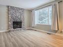 10710 104Th Avenue, Grande Cache, AB  - Indoor Photo Showing Living Room With Fireplace 