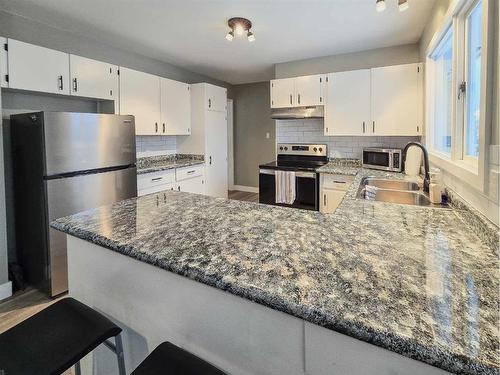 10710 104Th Avenue, Grande Cache, AB - Indoor Photo Showing Kitchen With Double Sink With Upgraded Kitchen