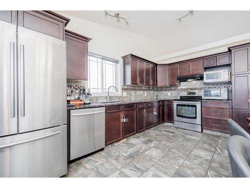 6934 115B Street, Grande Prairie, AB - Indoor Photo Showing Kitchen With Stainless Steel Kitchen